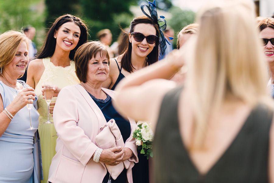 happy guests - shot by Courteen Hall wedding photograapher