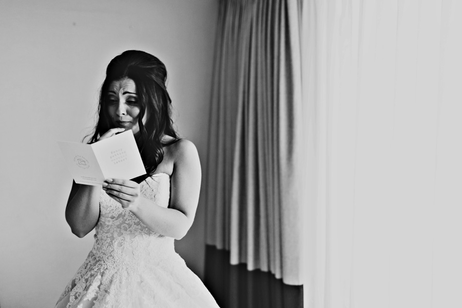 bride reads vows - photographed by Courteen hall wedding photographer