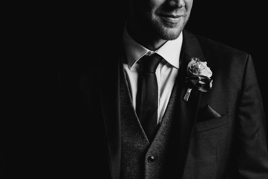 reportage style portrait of the groom - photography by Dodford Manor wedding photogrpaher - Elliot W Patching