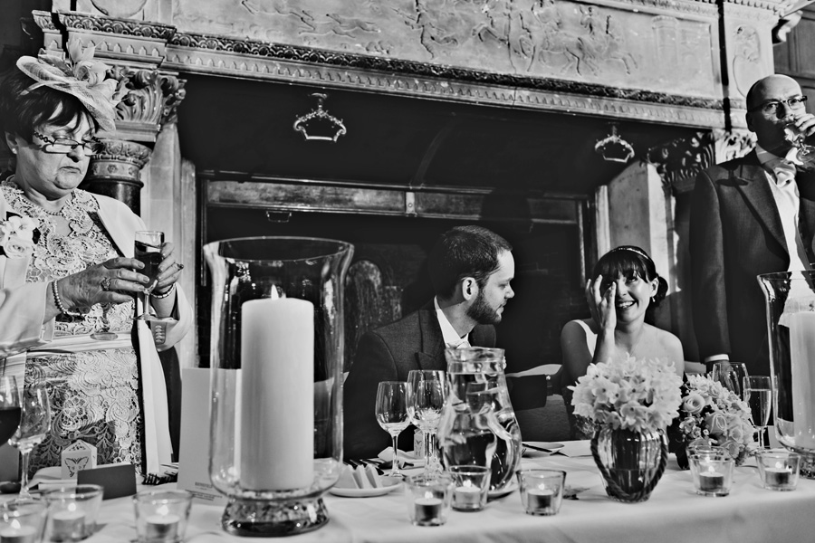 an emotional bride during the speeches