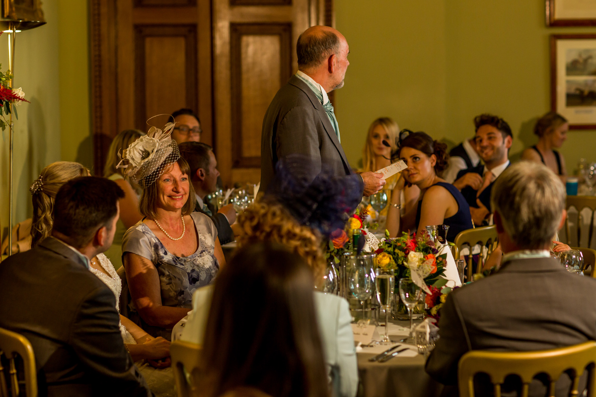 mother of the bride enjoying the wedding speeches