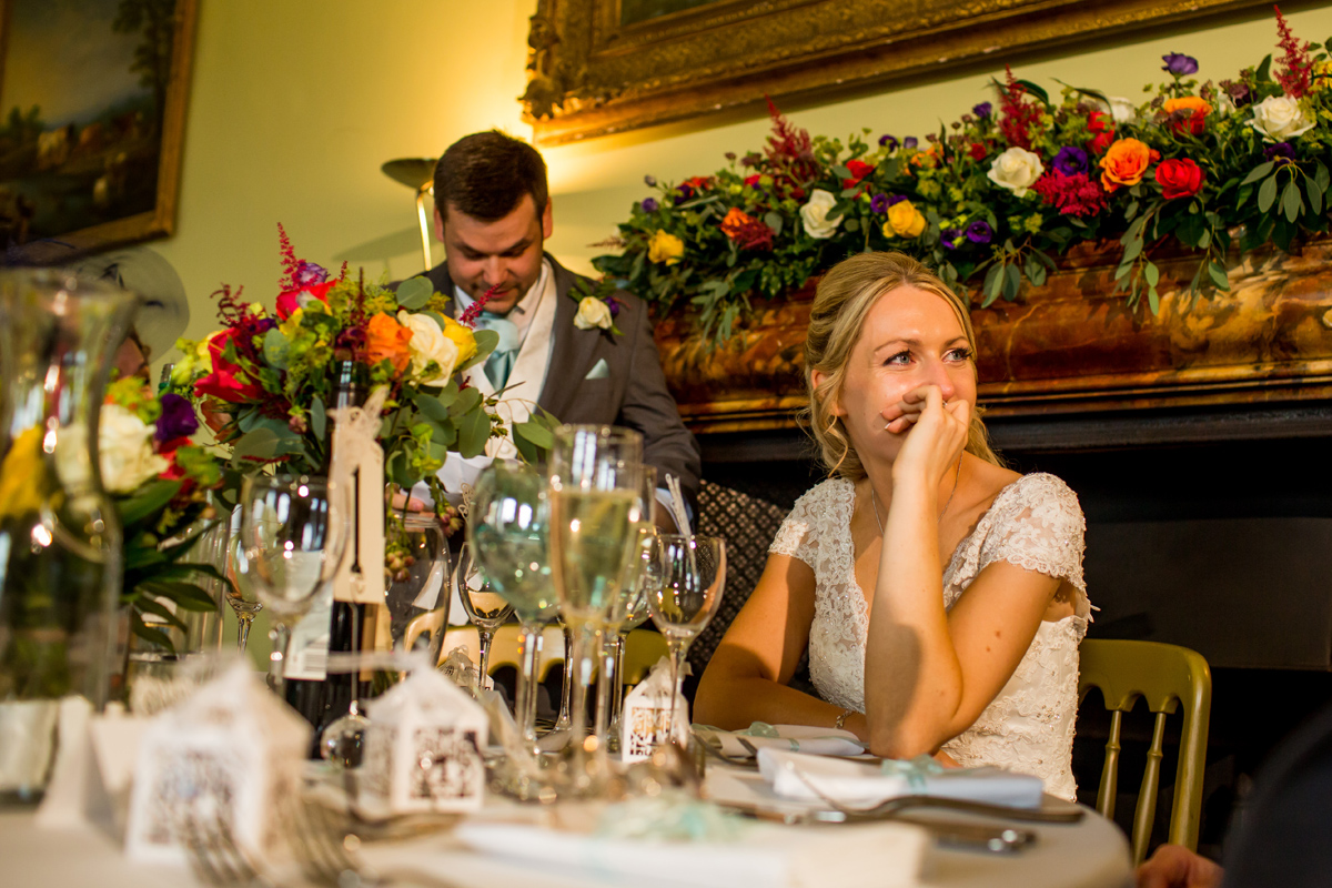 an emotional bride during the wedding speeches