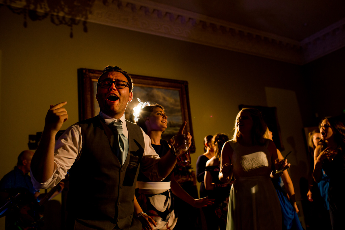 wedding guests dance the nigh away