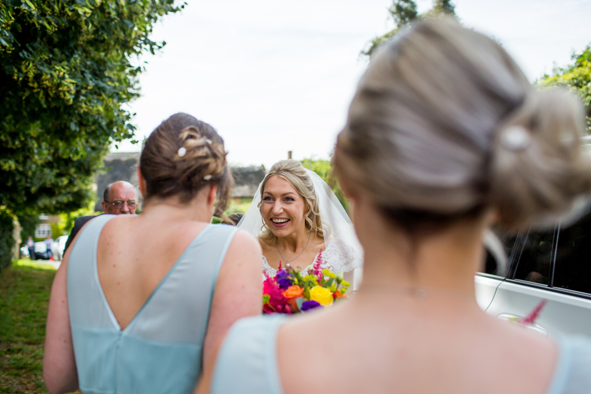 an excited bride arrives at the