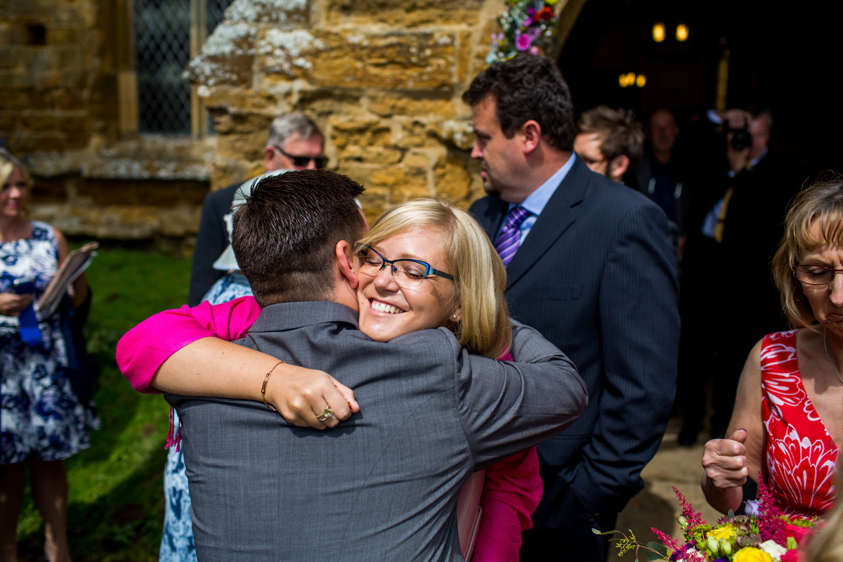 a guest congratulates a bride