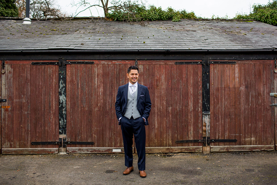 a groom in his wedding suit