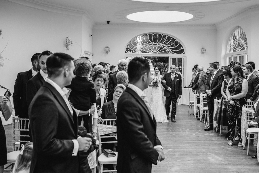 Walking down the aisle at Barton Hall