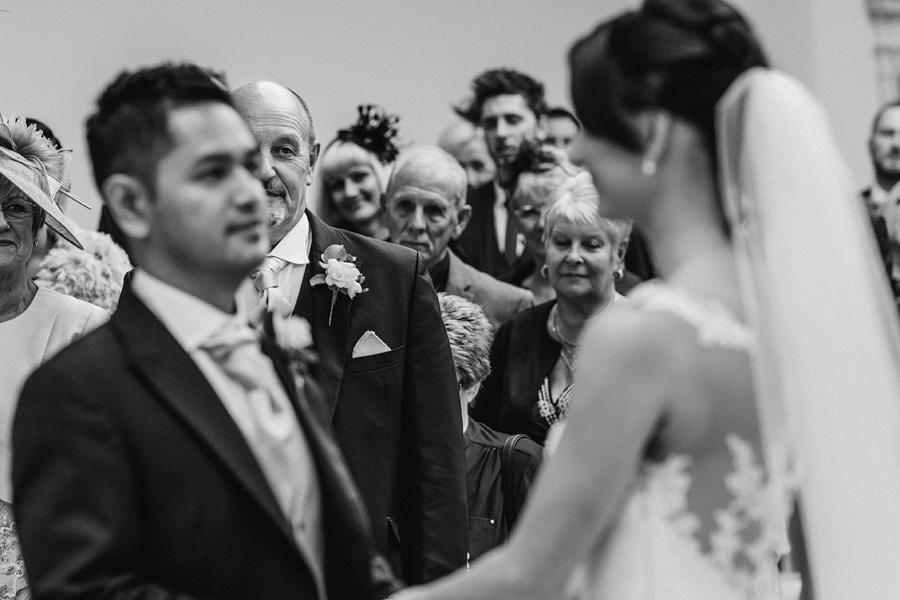 Father of the Bride watching his daughter get married