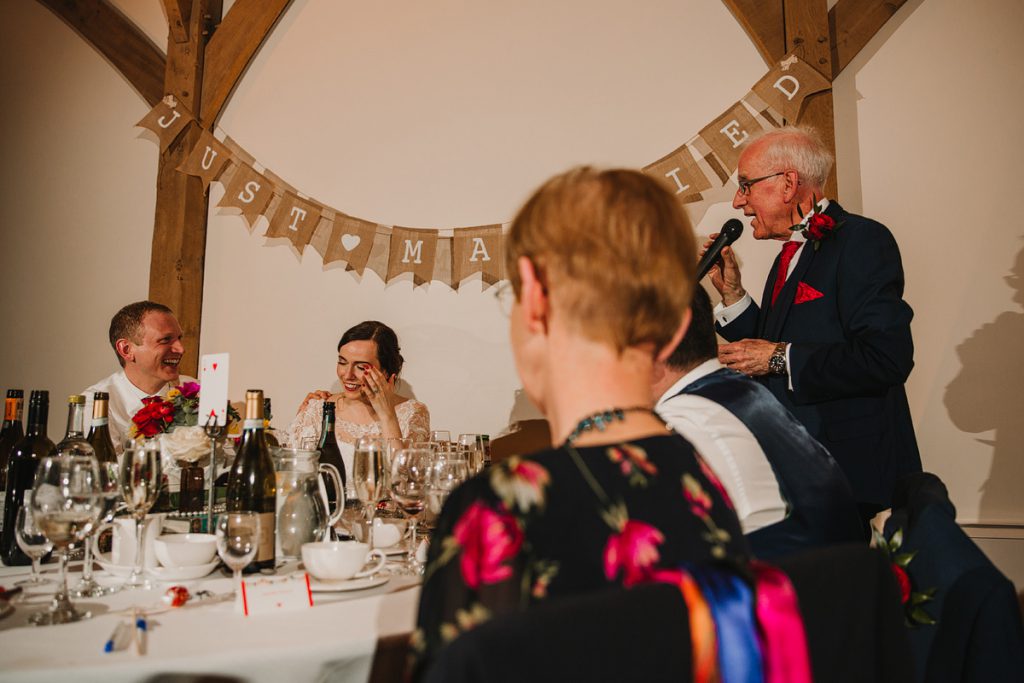 a photograph of emotional wedding speeches