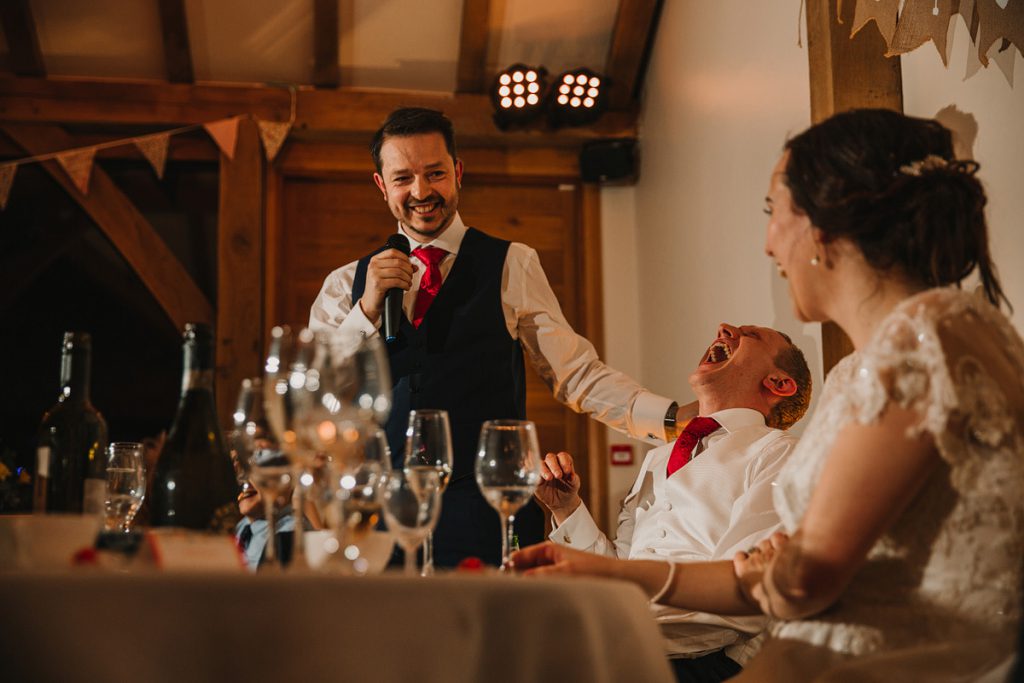 a great photograph of a wedding speech by Elliot w patching