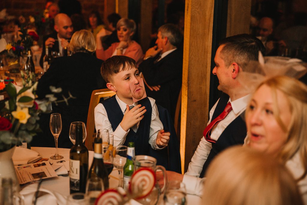 a fun photograph of a child at a wedding