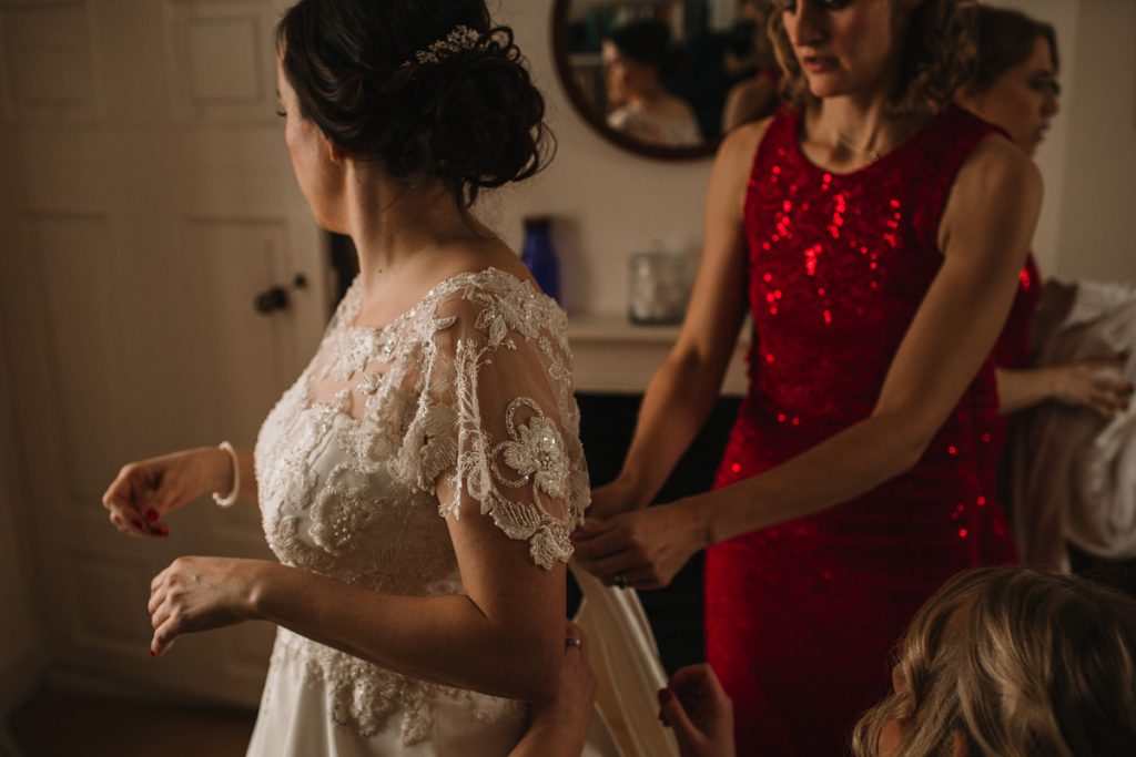 a colour image of a bride preparing for her wedding