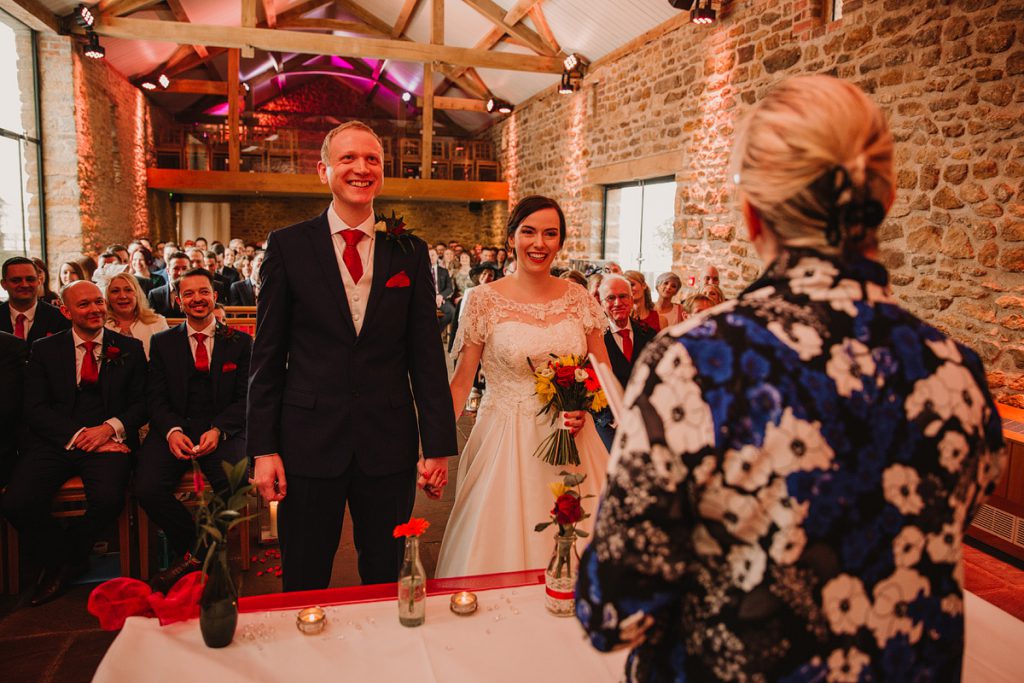 a bride and groom smile together