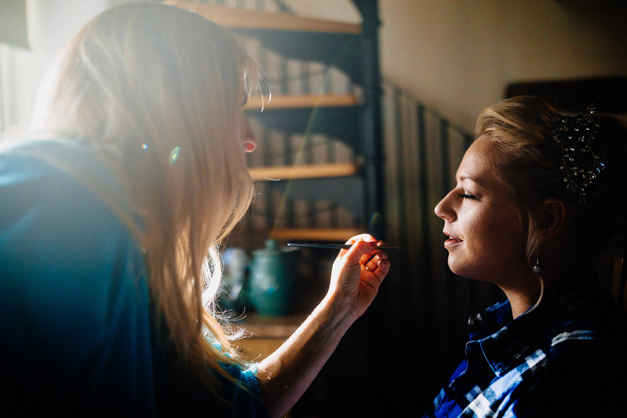 make up being applied to a bride