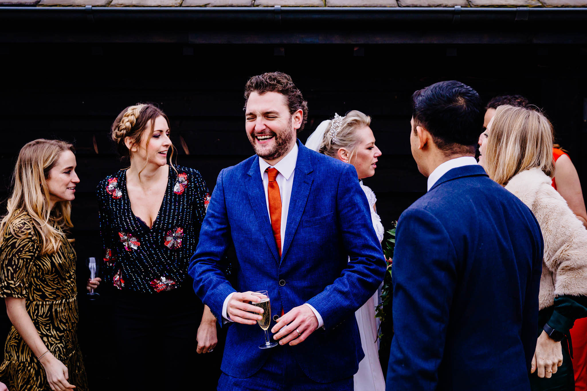 happy, smiling wedding guests