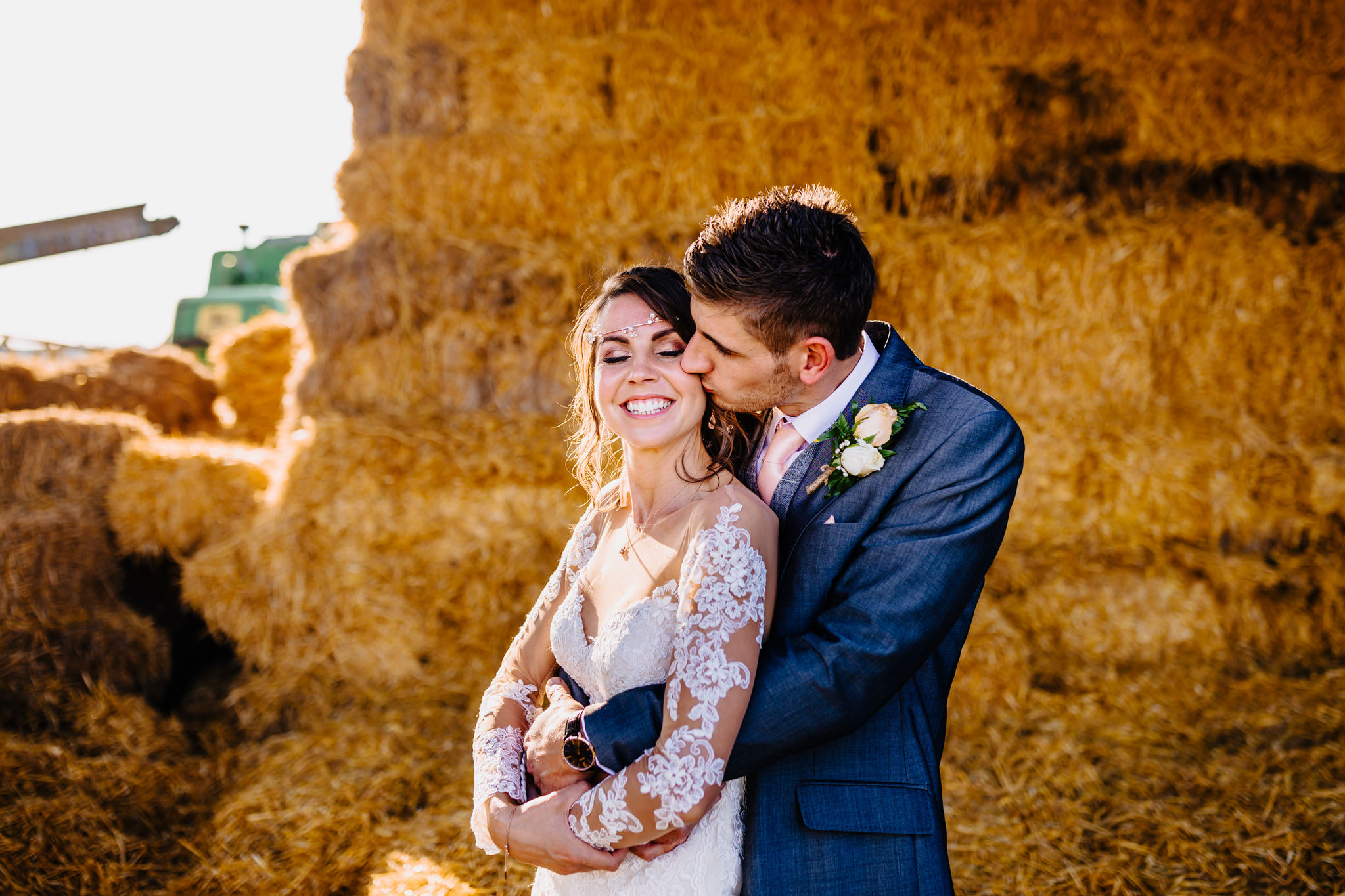 A happy bride and groom embrace