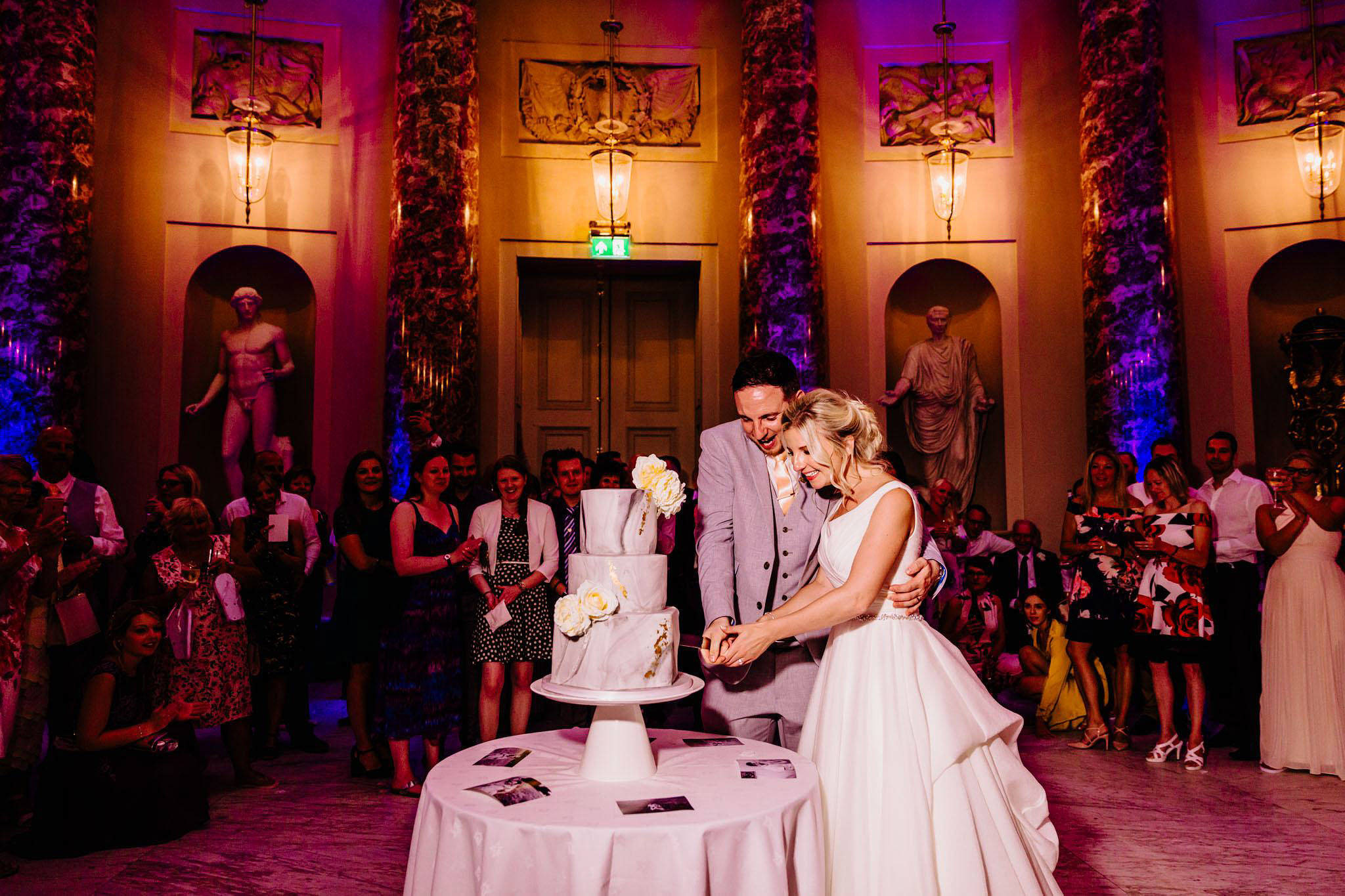 cutting the cake at a wedding