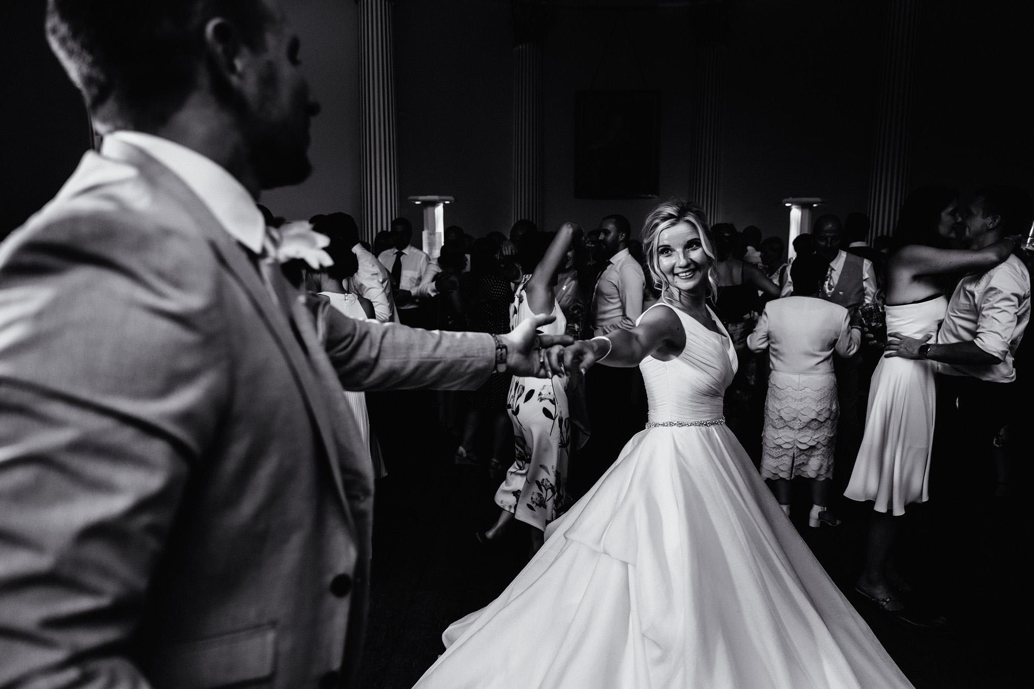 a wonderful dancing image at a wedding