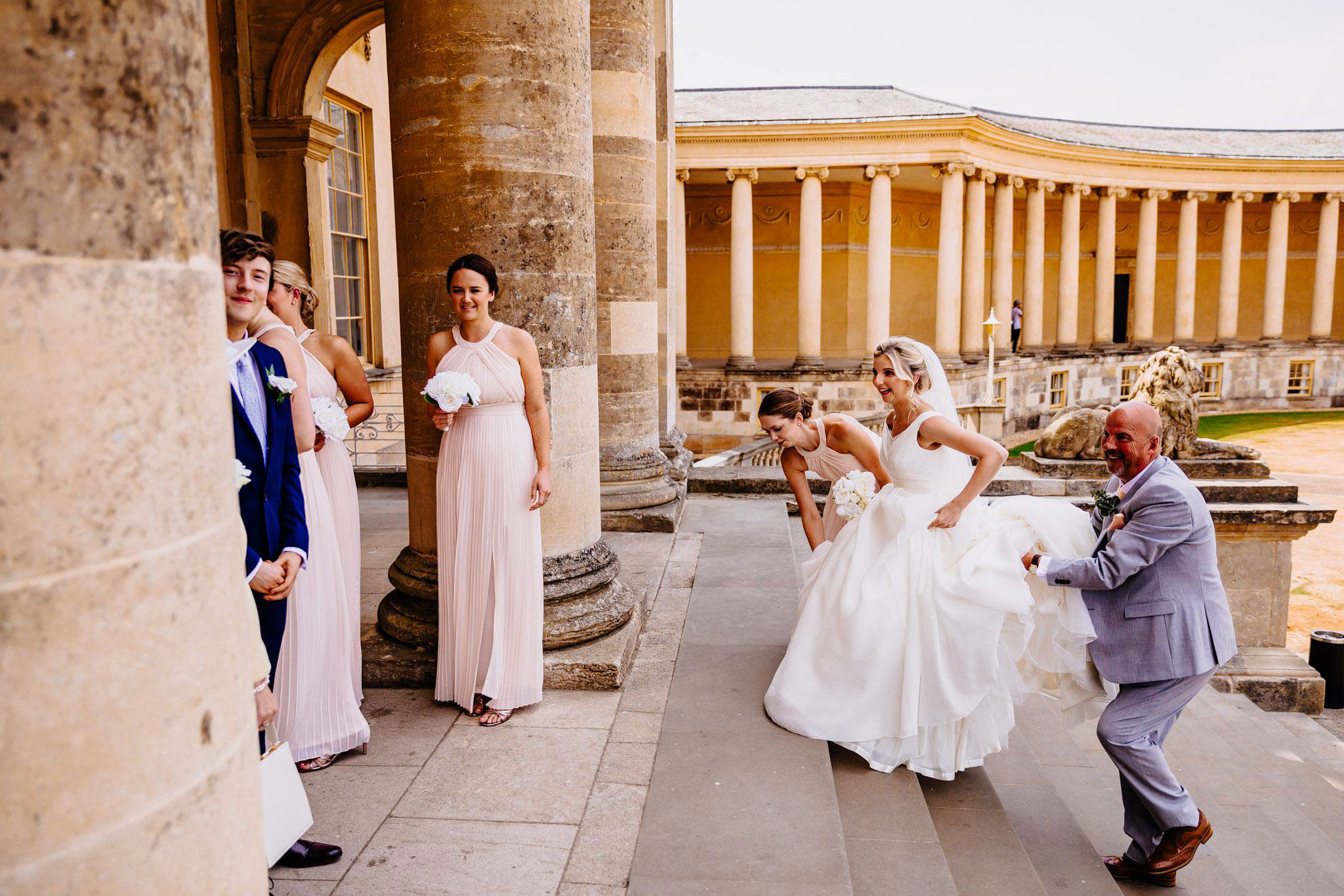 excited bridesmaid welcome the bride