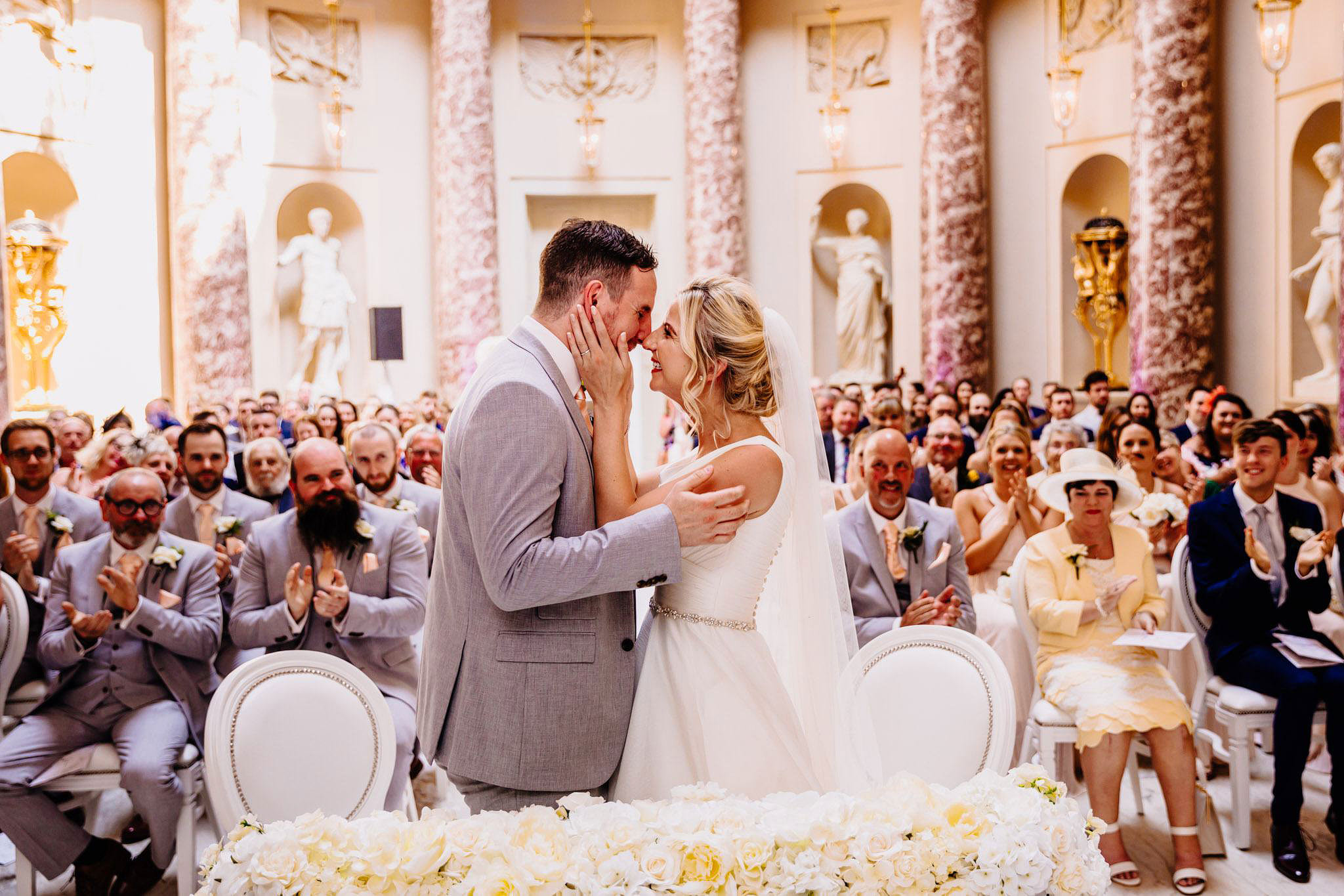 a tender moment between a bride and groom