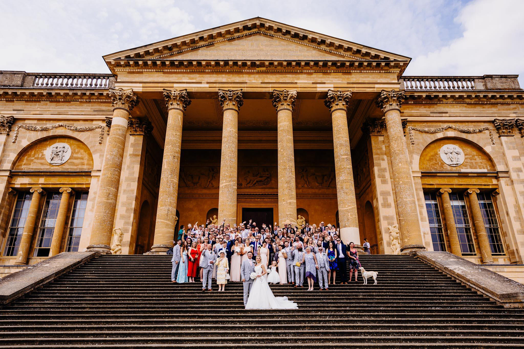 a group photograph at a wedding