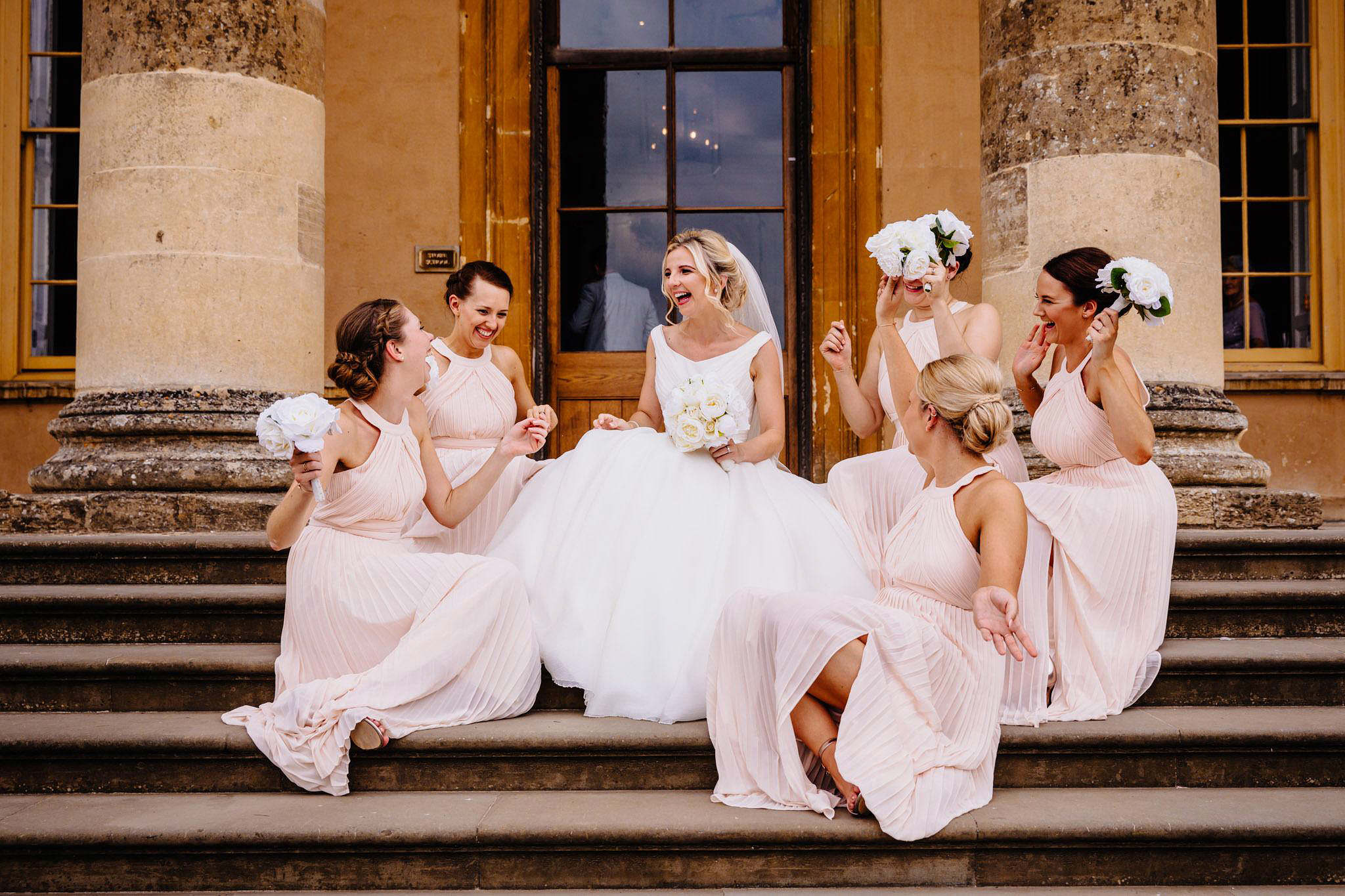 bridesmaids laughing together