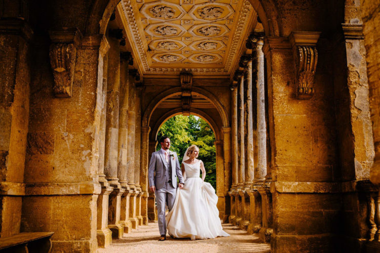 a bride and groom in beautiful surroundings