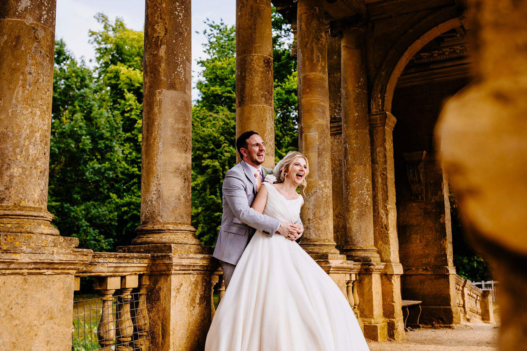 a happy moment between a bride and groom