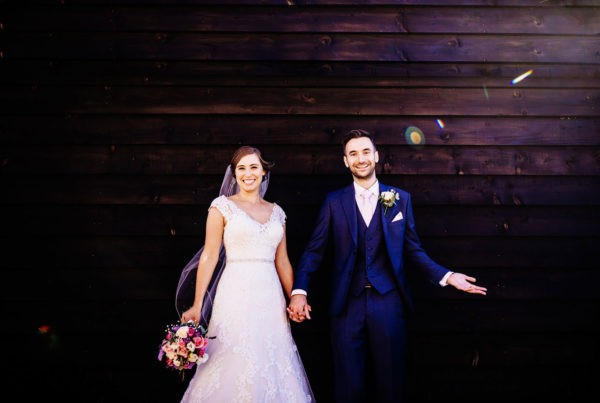 smiling bride and groom