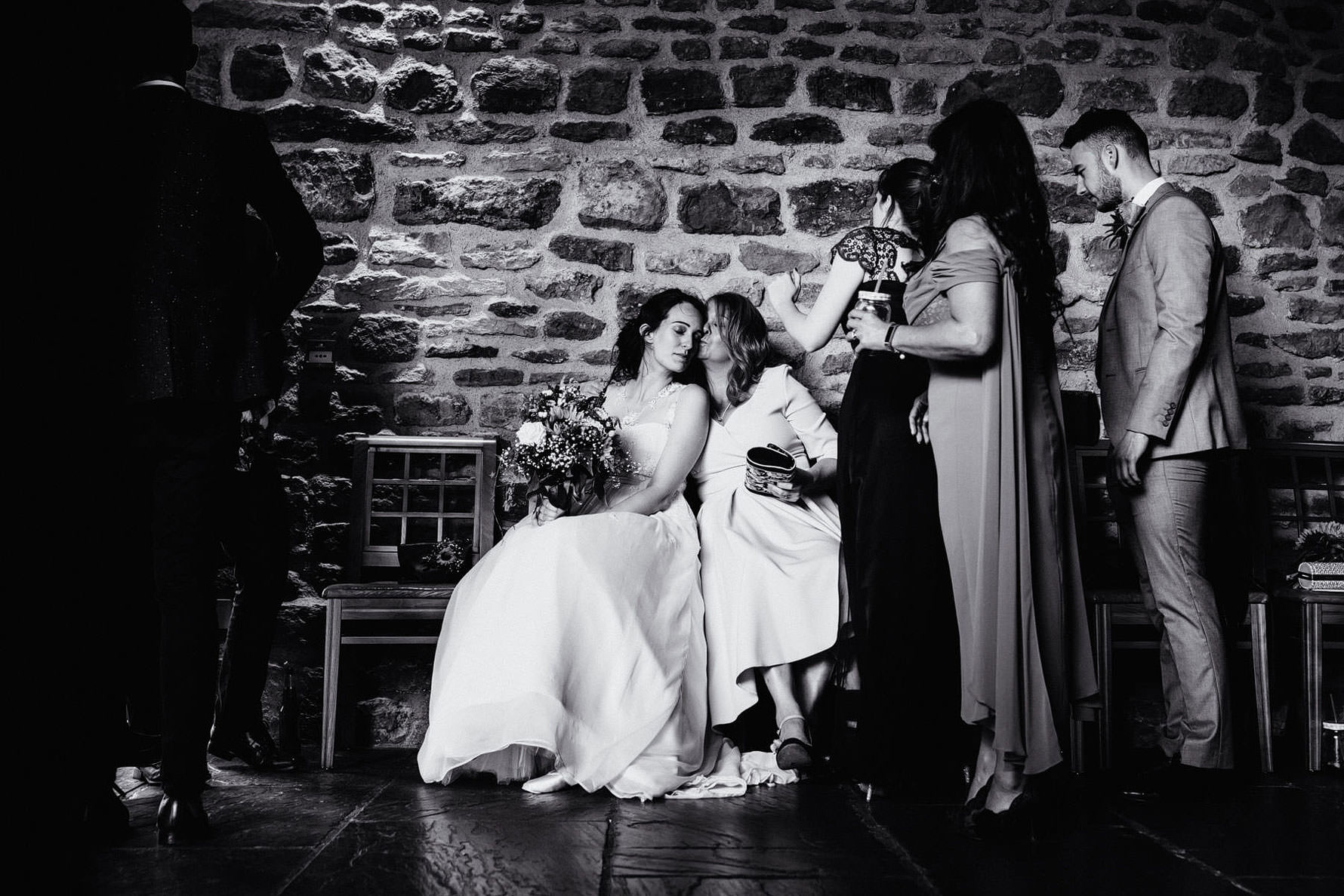 a beautiful moment between the bride and her mother