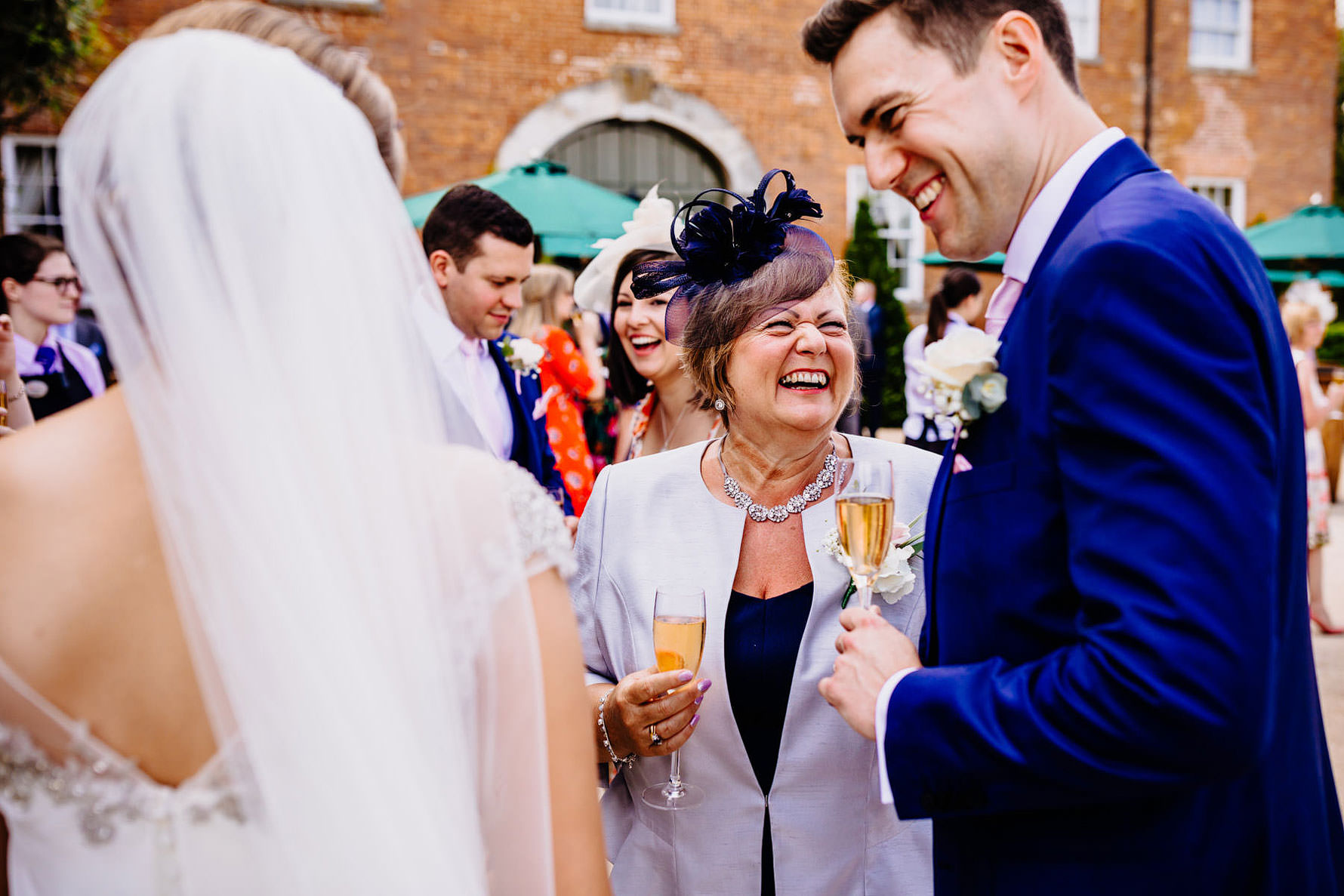 mother of the groom smiling