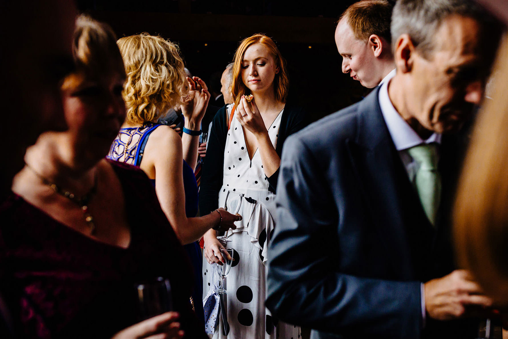 a guest enjoys a canapés