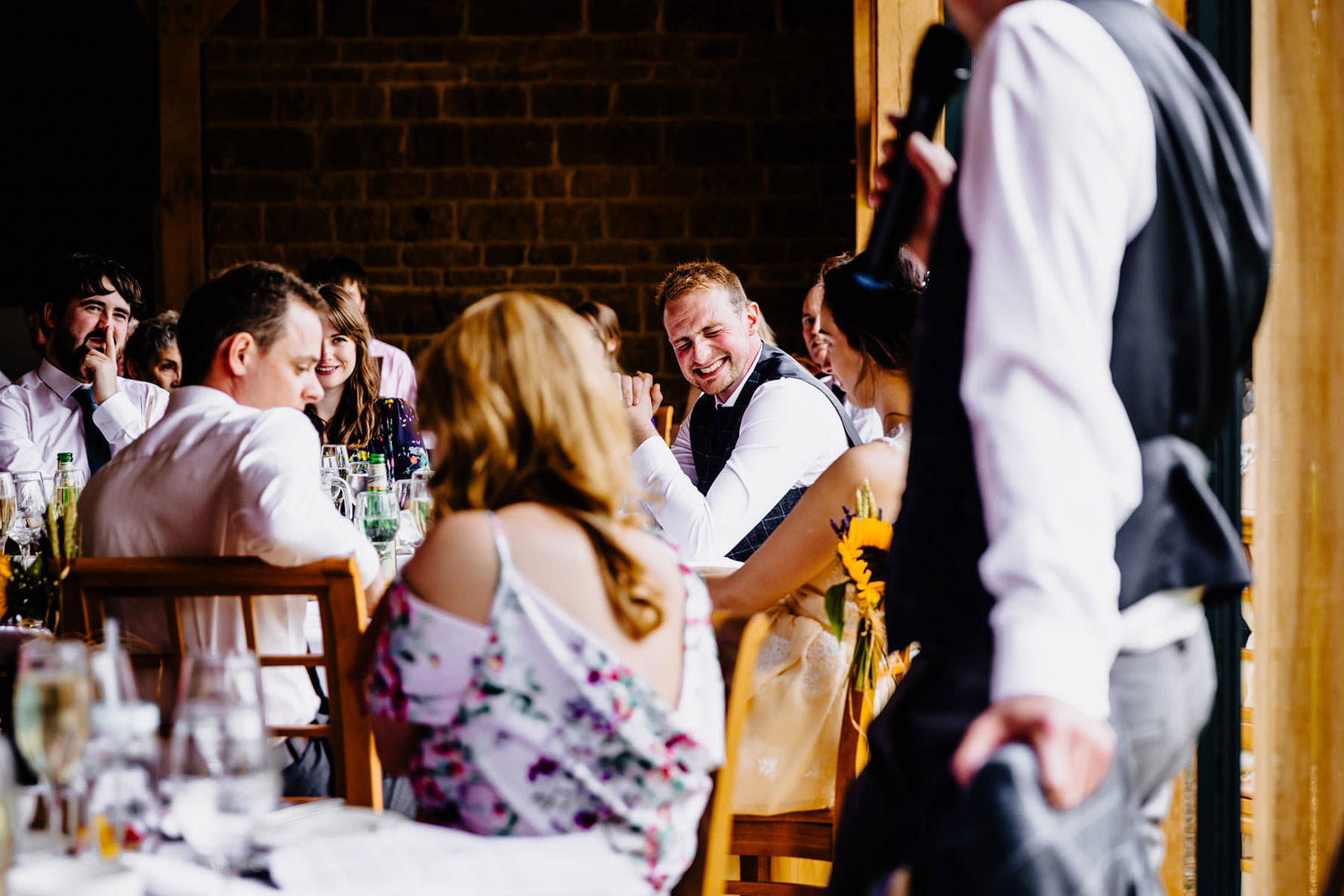 a bestman telling a joke during a speech