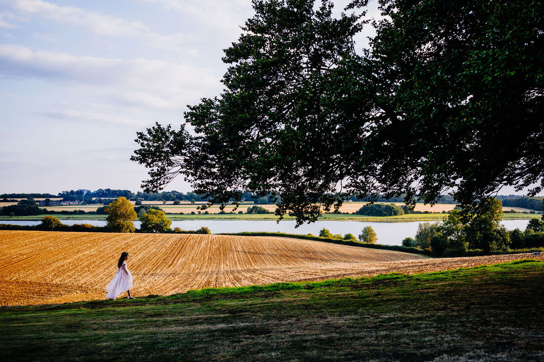 a little girl enjoying a wedding