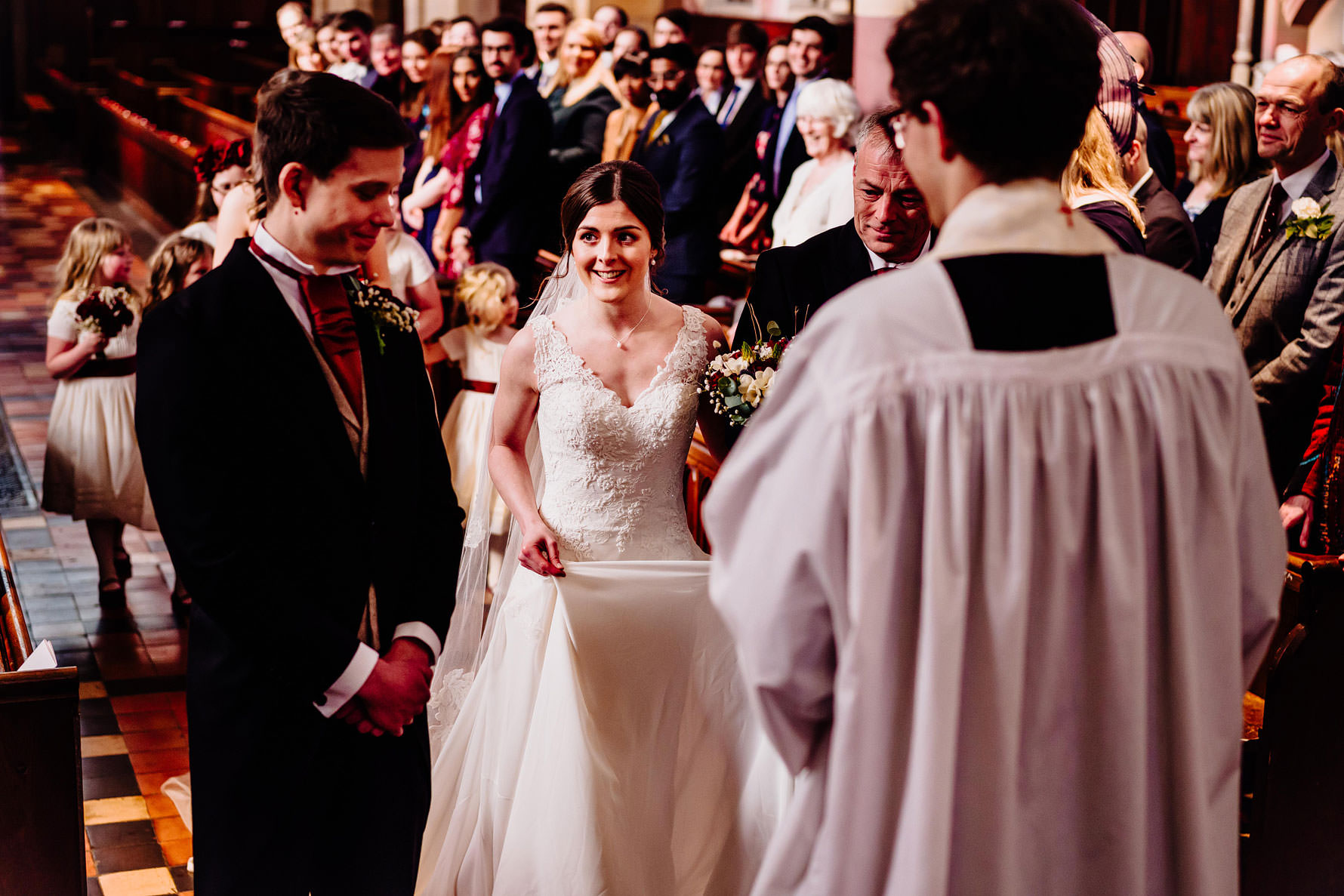 an excited bride sees her groom for the first time