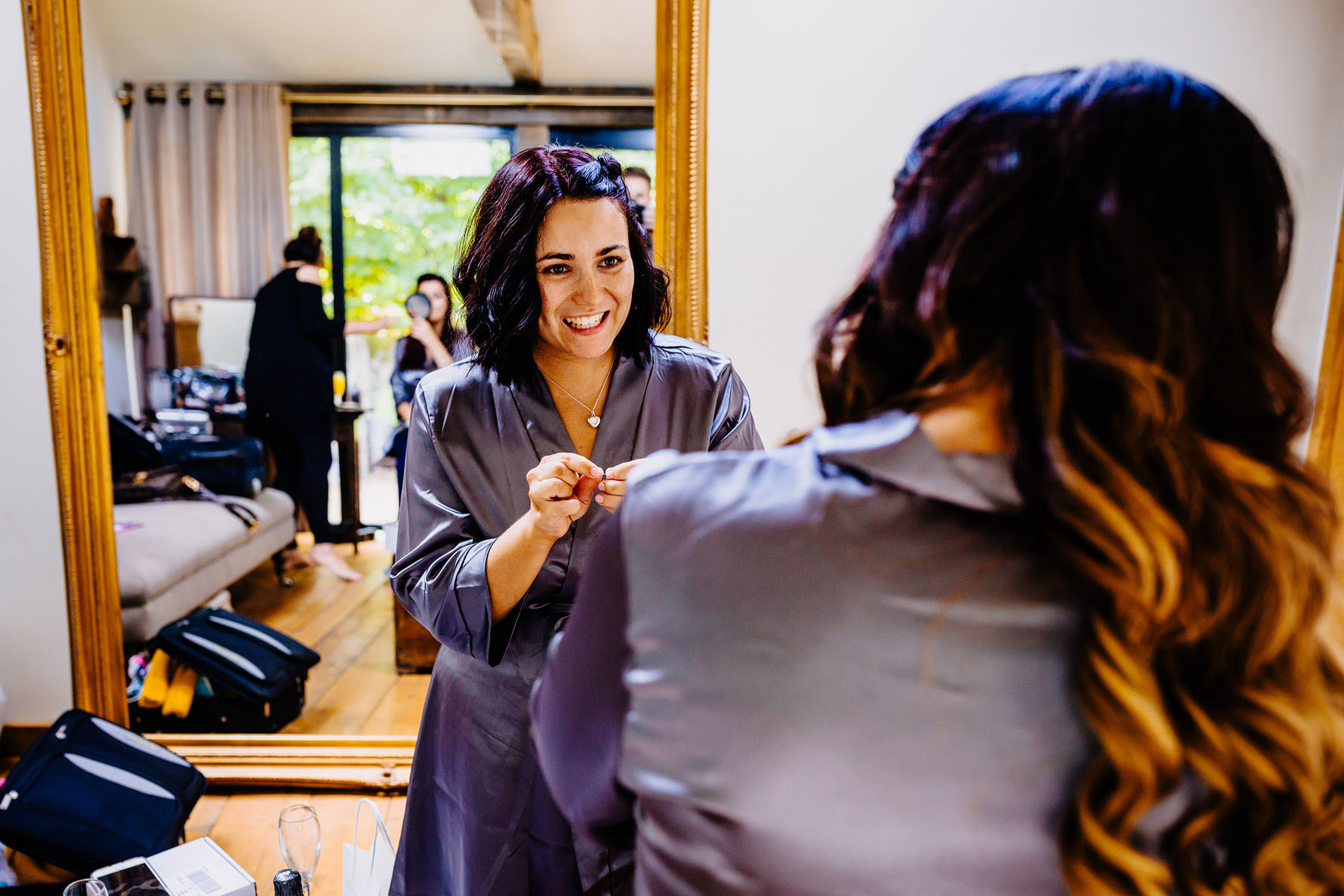 a bridesmaid during bridal preparations