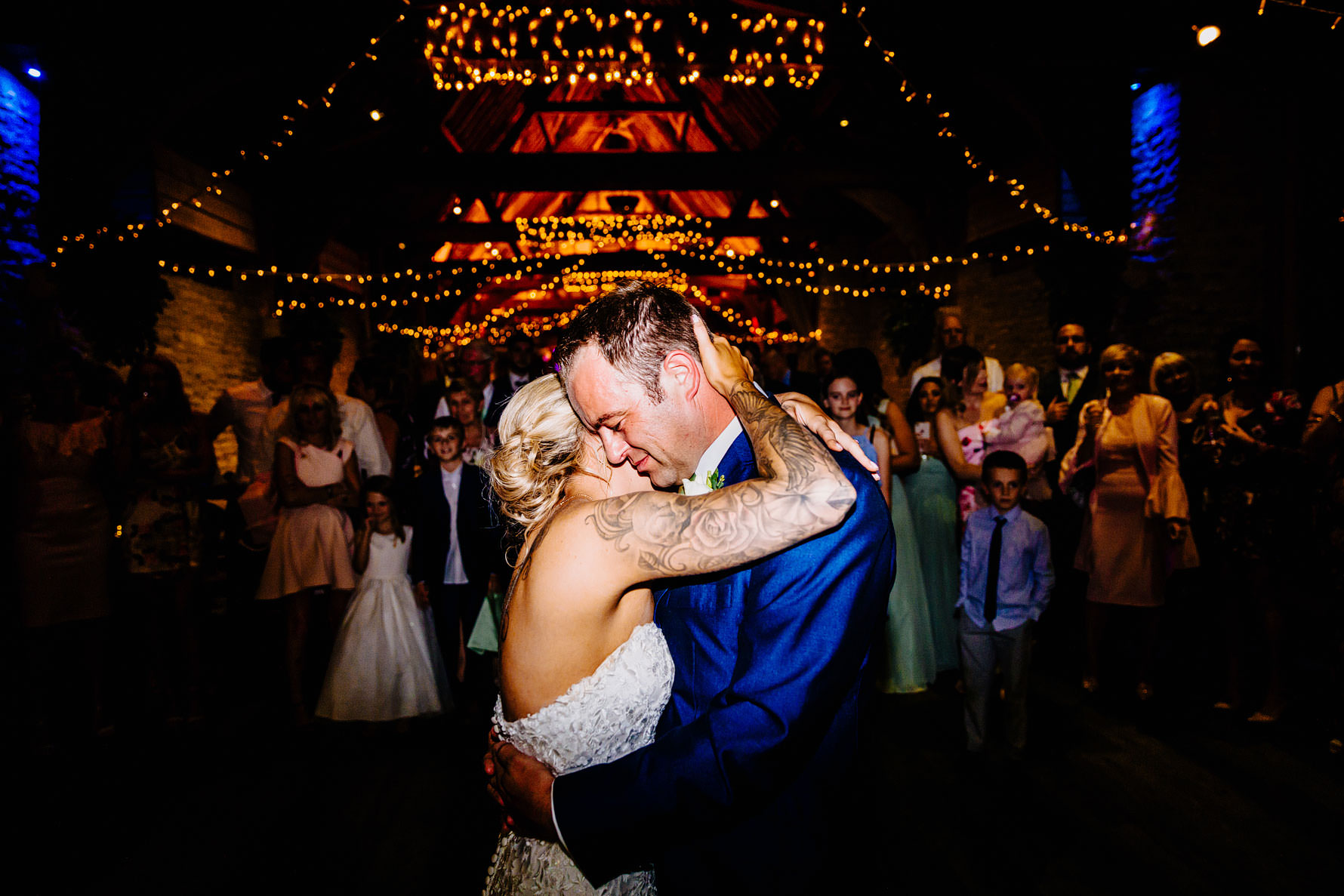 a tender moment between a bride and groom