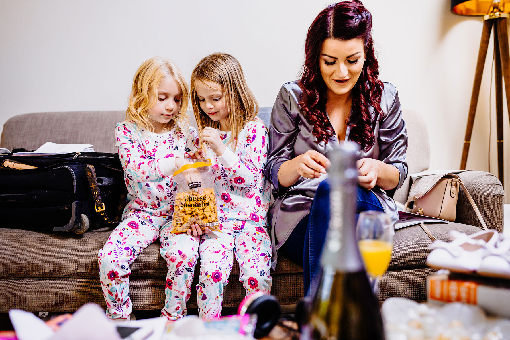 two children enjoy a snack