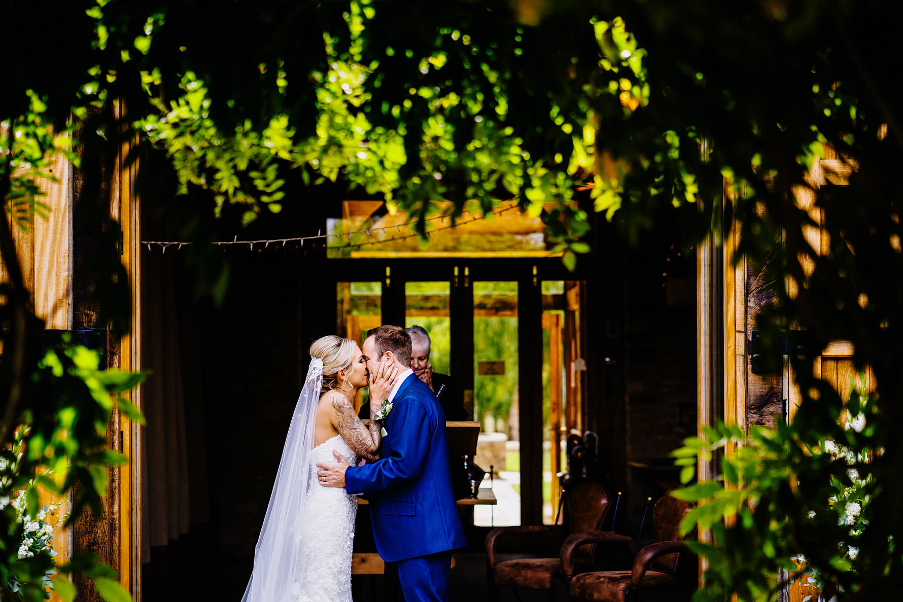 a bride and groom kissing