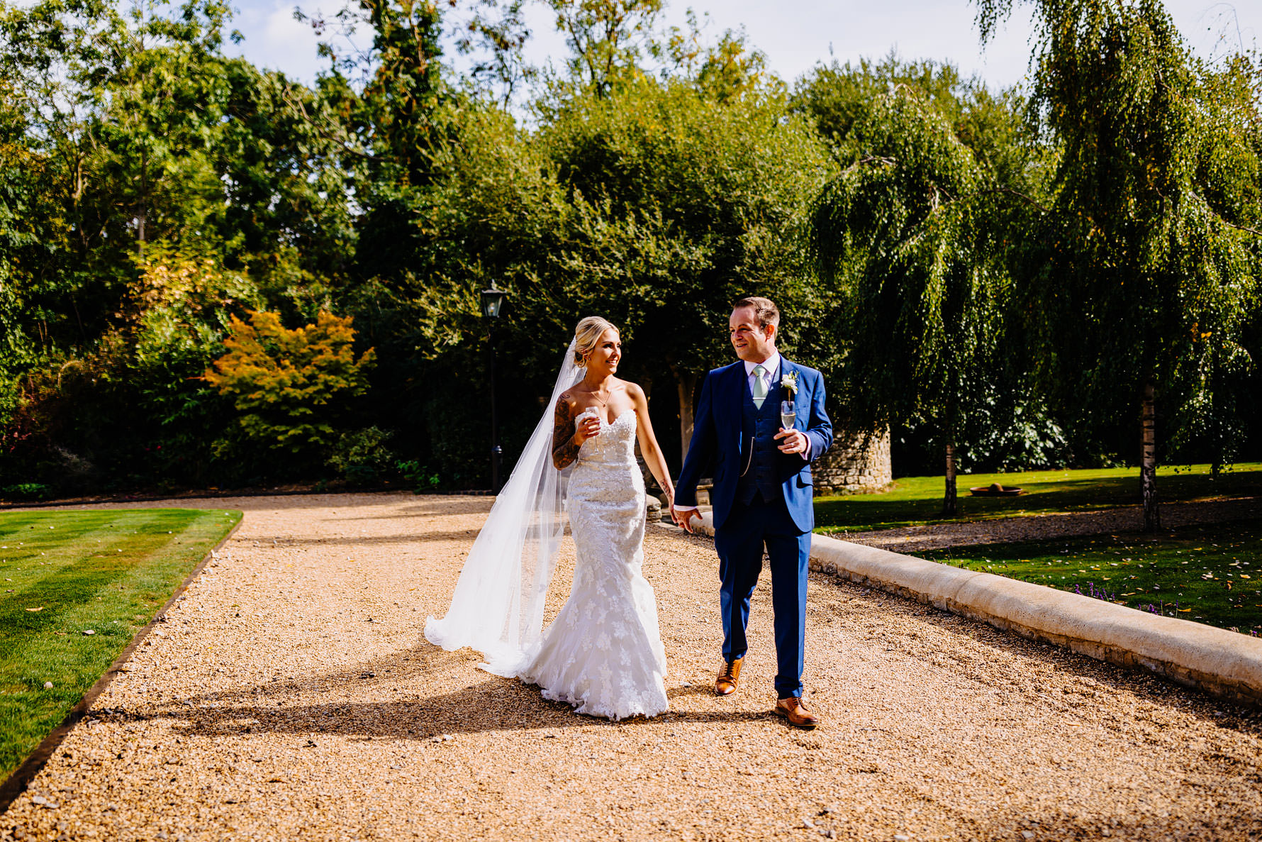 a bride and groom take a walk