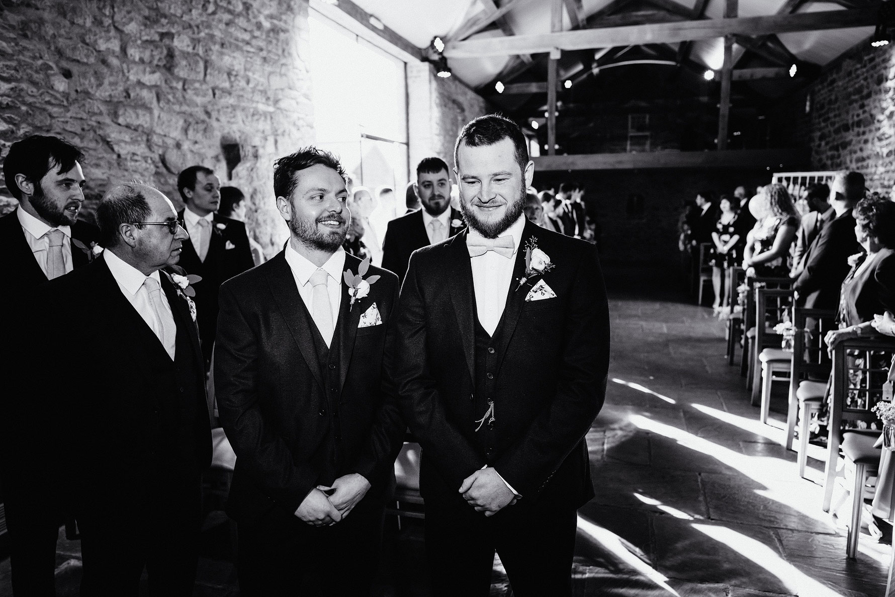 a groom awaits his bride