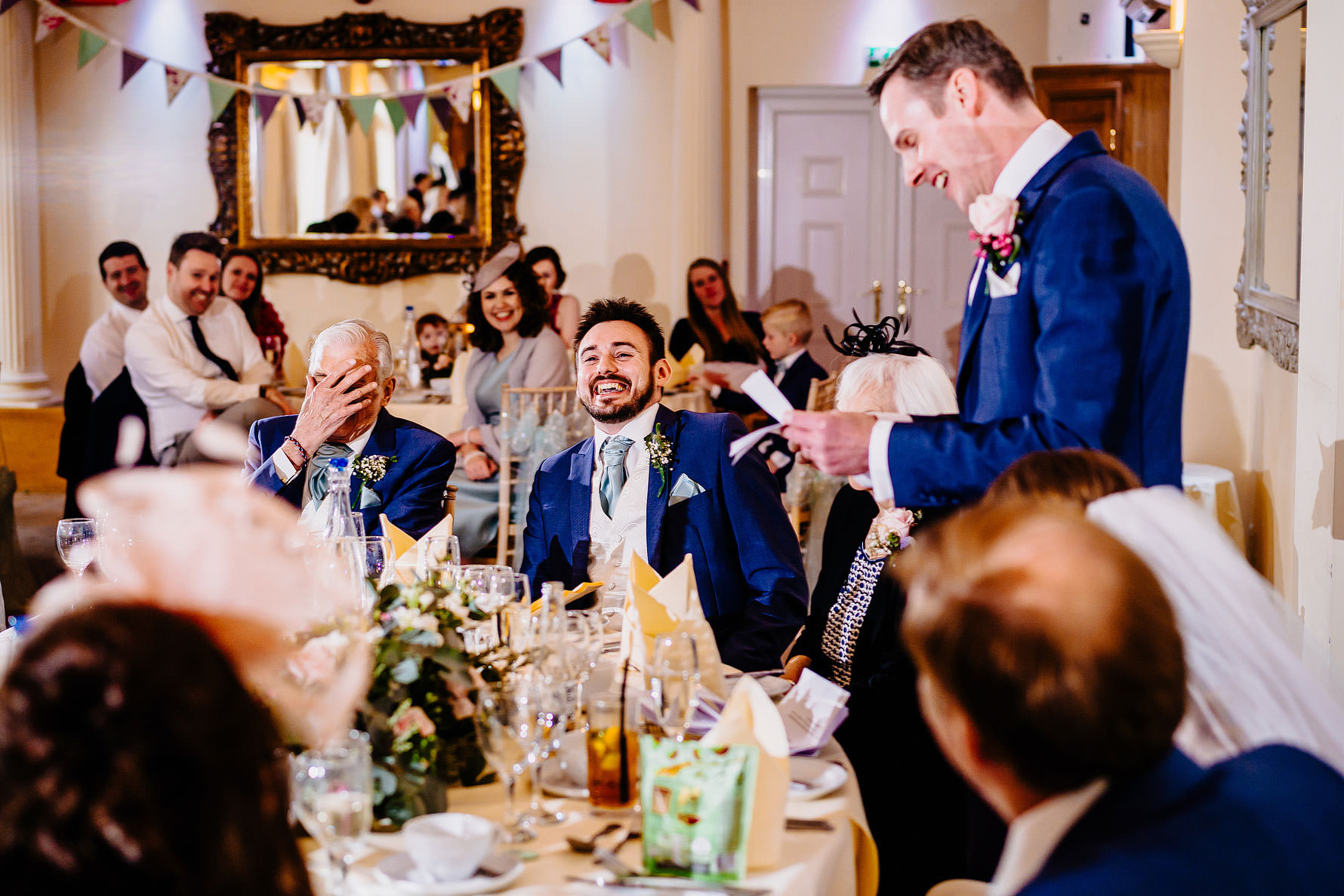 the groom making a speech at his wedding