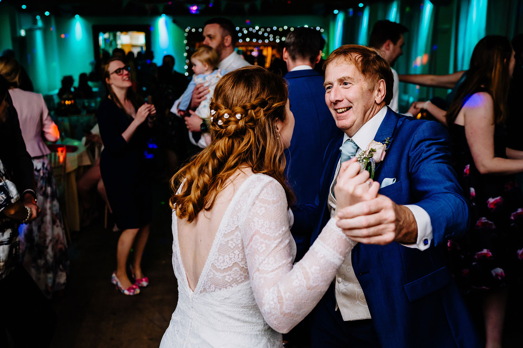 the bride dances with the father of the bride at her wedding