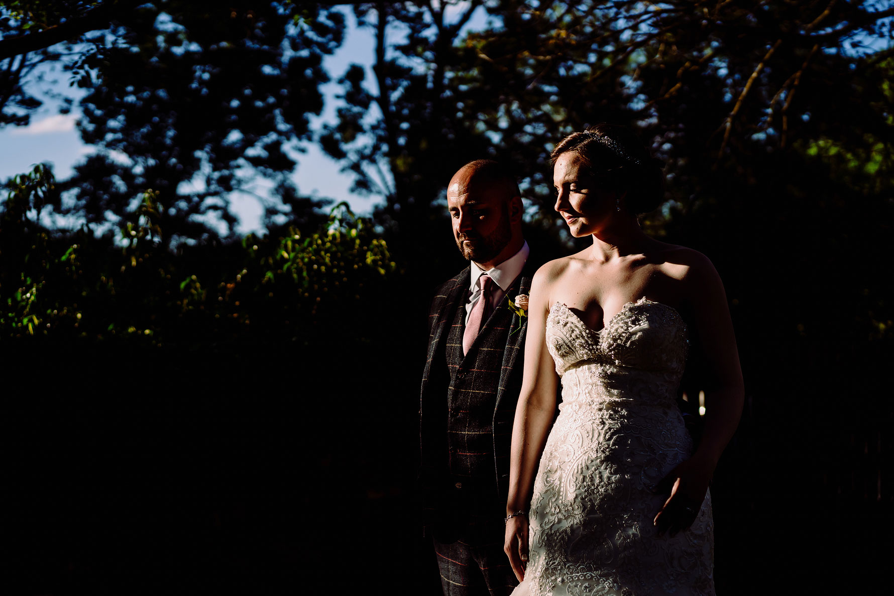 an artistic photograph of a bride and groom taken by Elliot w patching photography at Gorcott Hall.