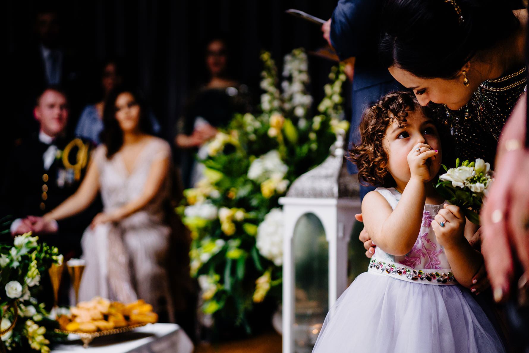 a flower girl and her mother