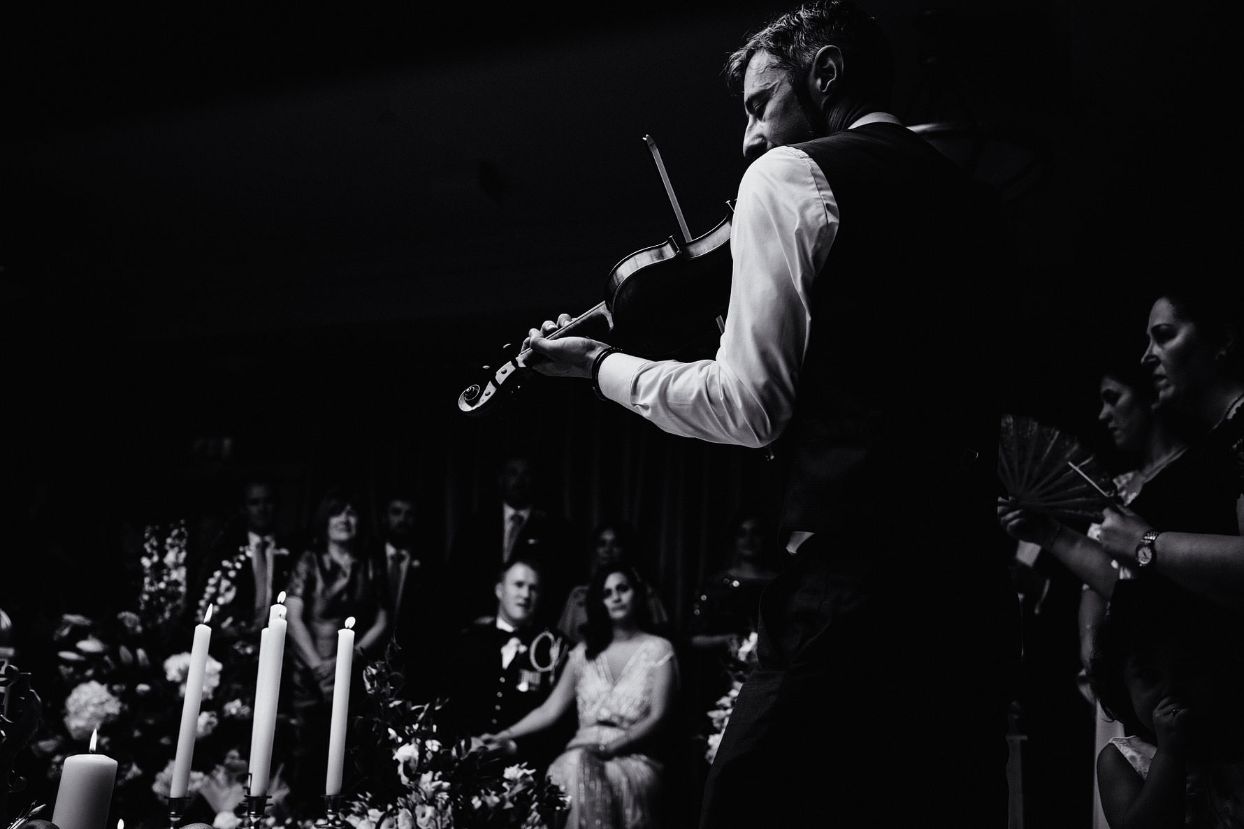 the fiddle being played at an Iranian wedding ceremony