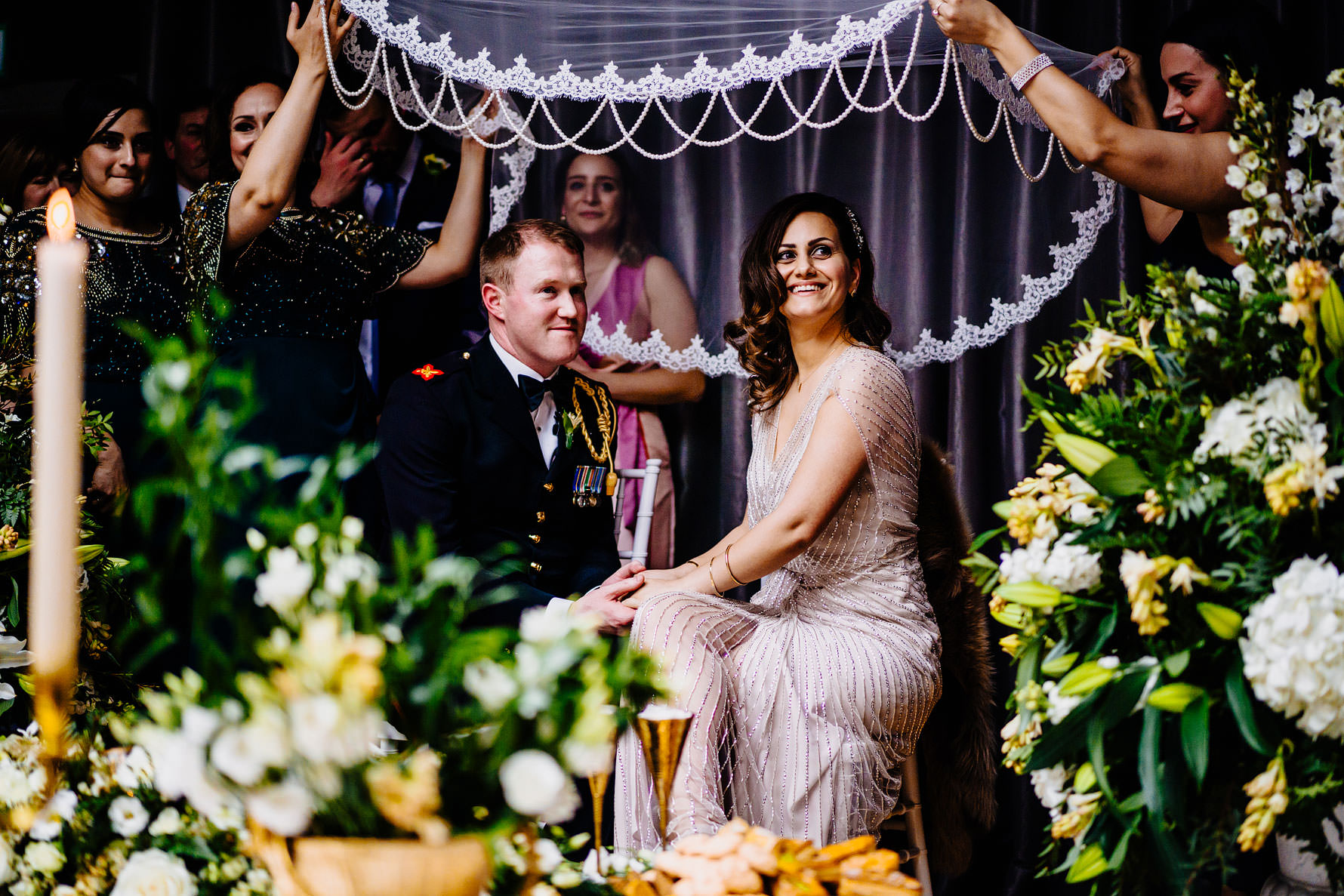 a smiling bride and groom