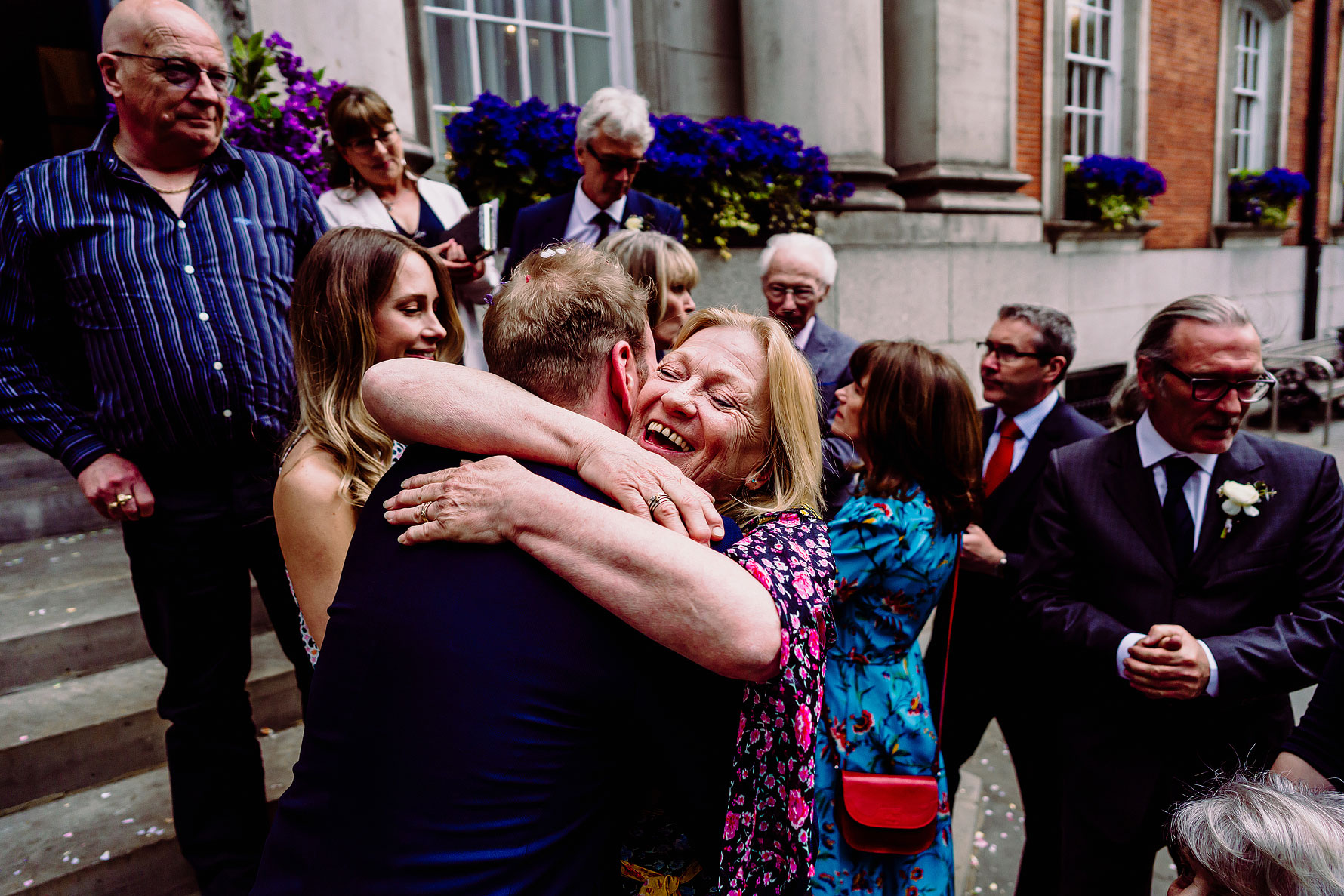 the mother of the groom congratulating her son