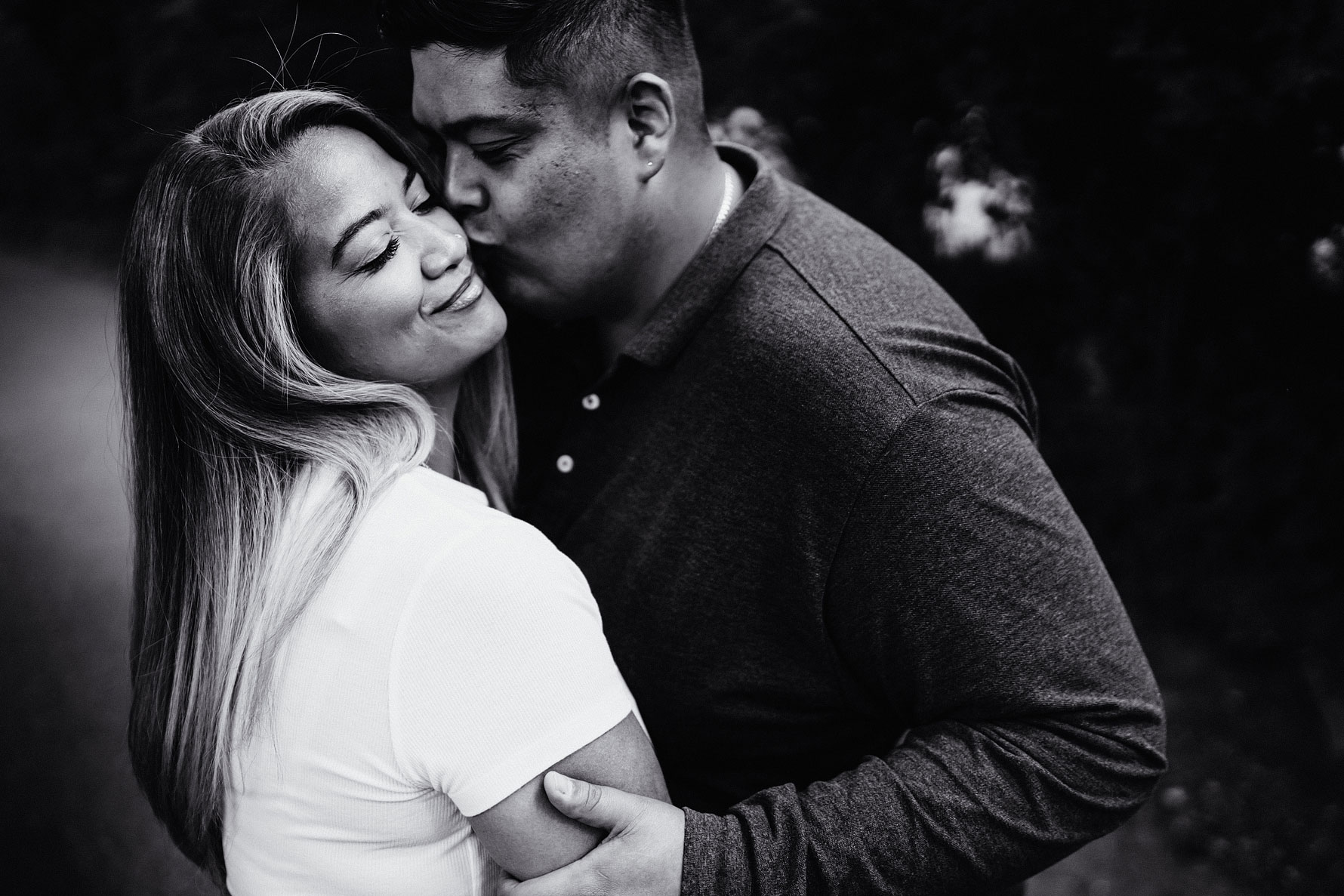 a couple share a tender moment on their engagement shoot photographed by Elliot w patching photography