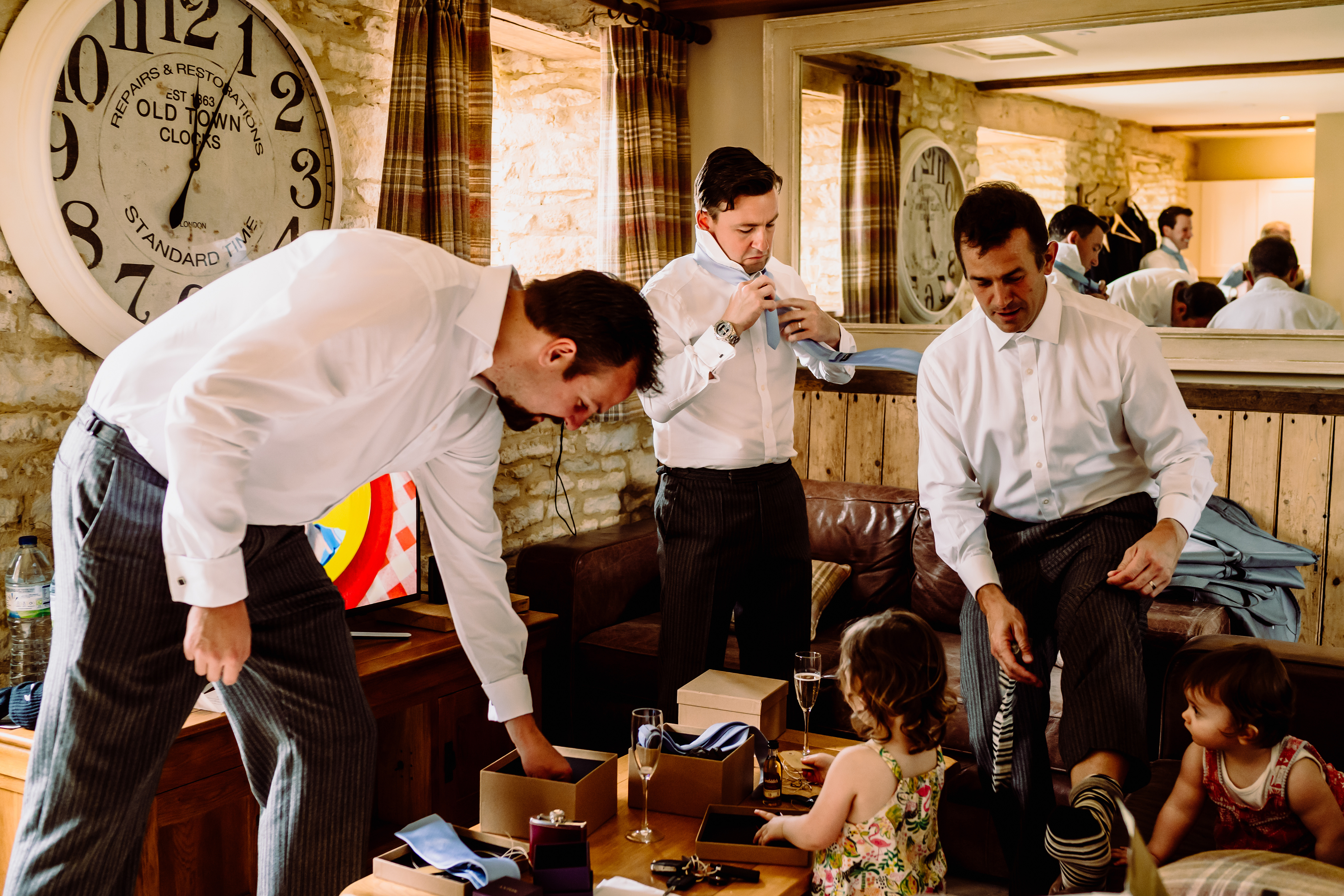 men preparing for a wedding